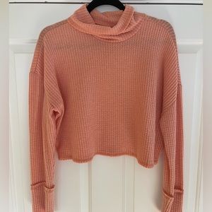 Coral, cropped turtle neck sweater